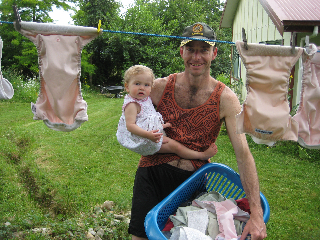Theron and Isla doing the washing