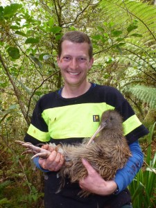 DOC Biodiversity Ranger Pete McMurtrie with one of the two breeding Kiwis introduced to Sinbad Gully med res